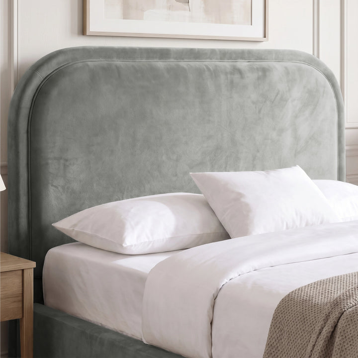 [Light Grey | Double] Close-up of plush padded curved headboard with raised border piping that keeps its shape