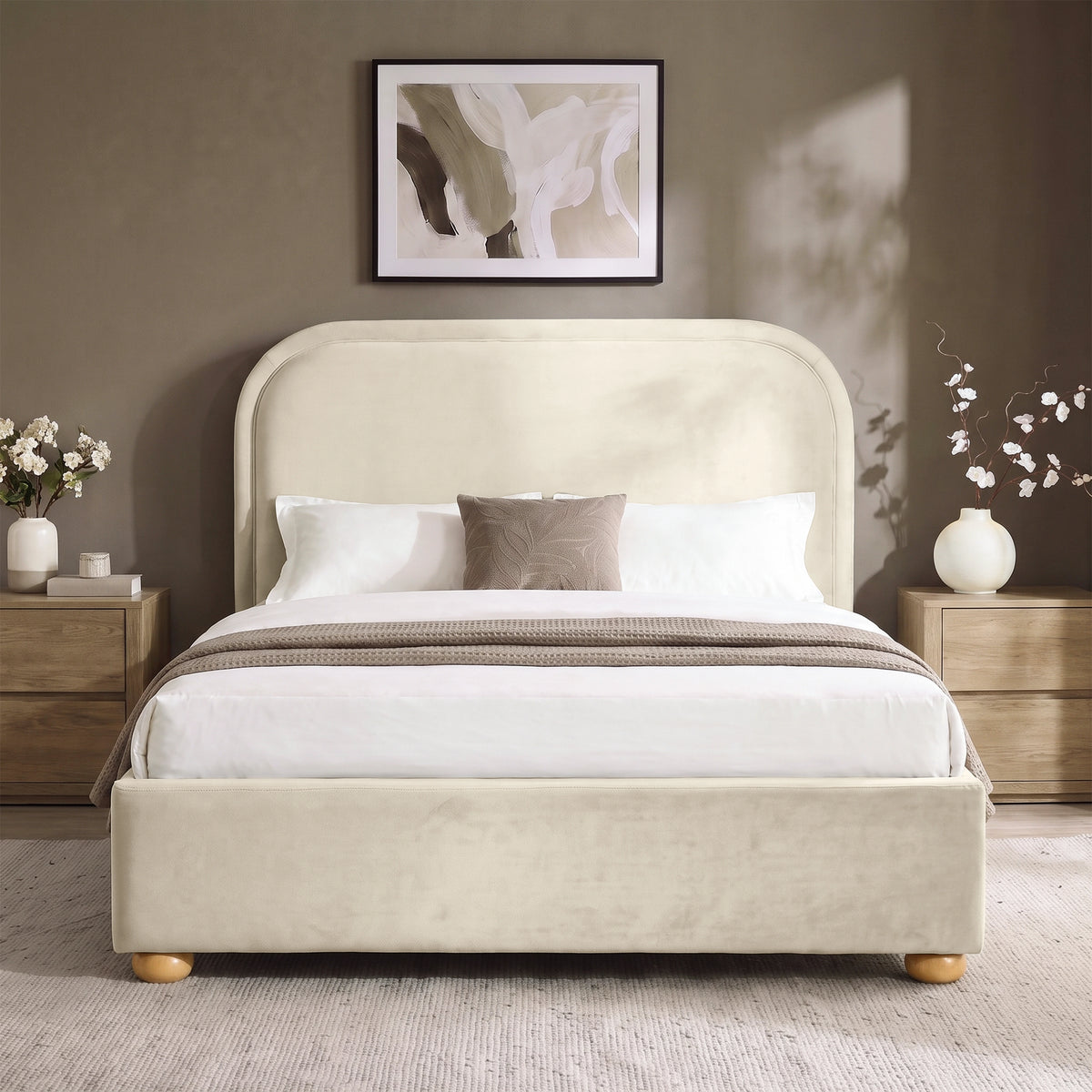 [Beige | King] Curved headboard ottoman bed in beige plush velvet, front bedroom view with rounded wooden feet
