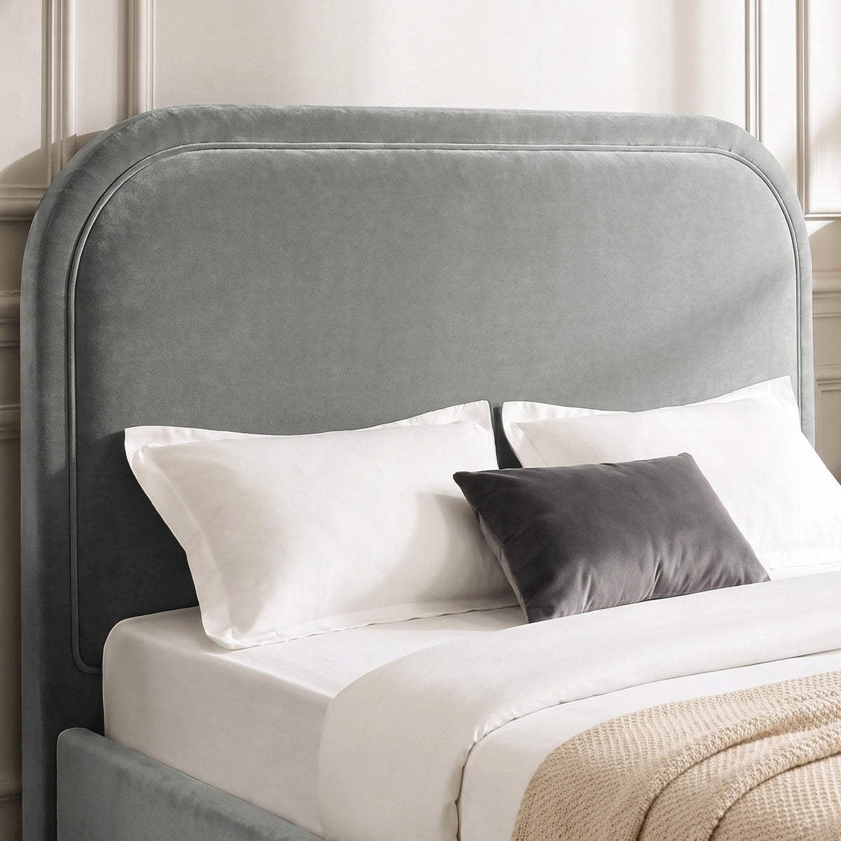 [Light Grey | King] Close-up of plush padded curved headboard with raised border piping that keeps its shape