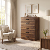 [Dark Bronx] Wide lifestyle view of the Dark Bronx Tall 5 Drawer Chest styled in a warm bedroom.