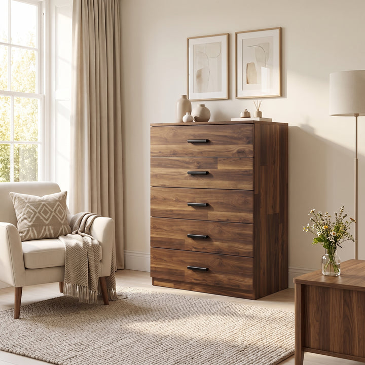 [Dark Bronx] Wide lifestyle view of the Dark Bronx Tall 5 Drawer Chest styled in a warm bedroom.