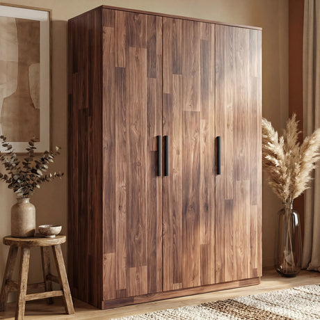 [Dark Bronx] wardrobe placed against a wall in a natural light room with glass planter beside it