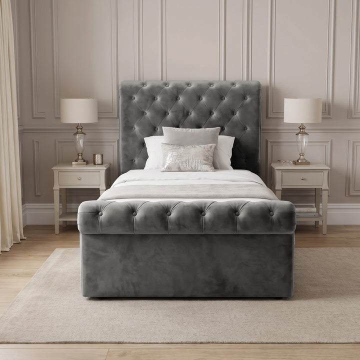 [Single | Dark Grey] Front view of the Chesterfield Single Ottoman Storage Bed Dark Grey Velvet showing the button-tufted footboard.
