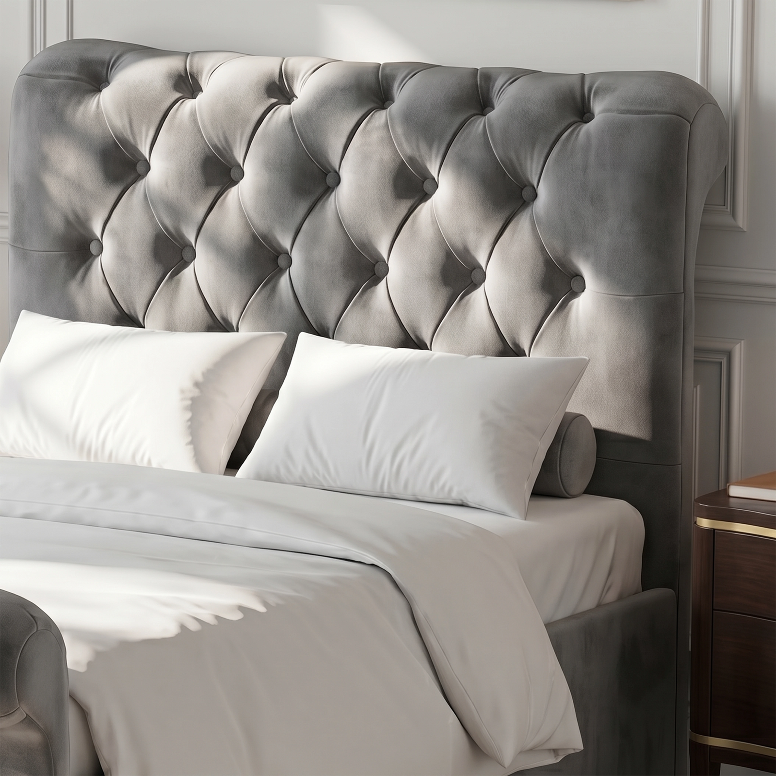 [Dark Grey] Close view of Chesterfield tufted headboard with deep button detail and white pillows below.