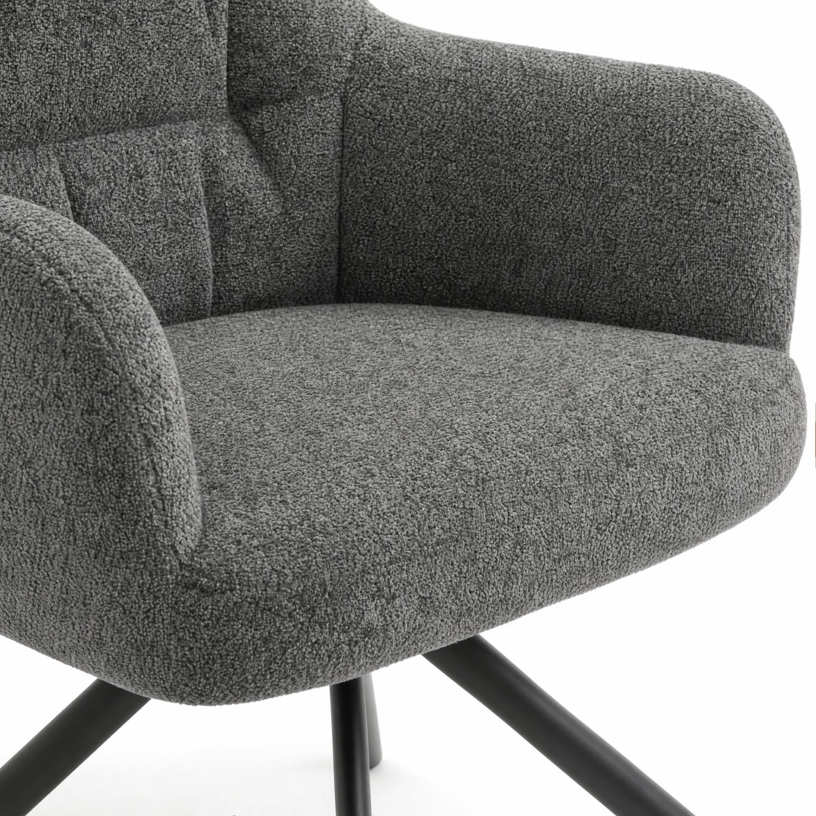 [Dark Grey | Set of 2] Dining chair close-up of boucle seat, rounded arm and stitched padded back, with black legs partly visible.