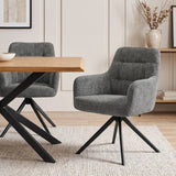 [Dark Grey | Set of 2] Two swivel dining chairs beside a pale wood table, featuring stitched backs, armrests and black legs.