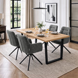 [Dark Grey | Set of 4] Four swivel dining chairs with metal legs at a wood table set styled with plates, wine glasses and a vase.