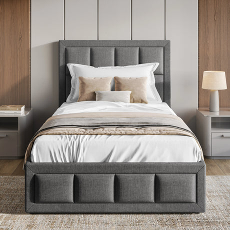 Front-facing view of dark grey single ottoman bed frame with headboard, styled with beige and white bedding in a modern room.