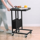 [Grey Marble] movable side table being rolled on caster wheels with snacks and drink on tabletop