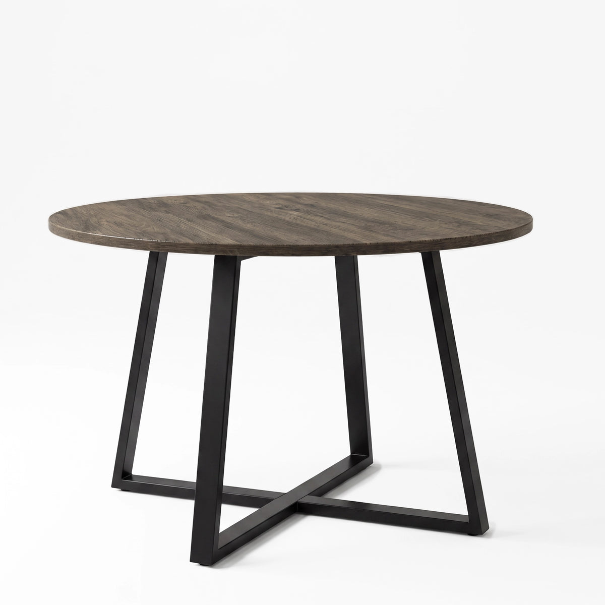 [Dark Wood] Round wood-effect dining table in a studio view with the tabletop resting on a black iron cross base.