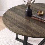 [Dark Wood] Close-up of the round wood-effect tabletop with visible grain, styled with a black vase, books and a bowl.