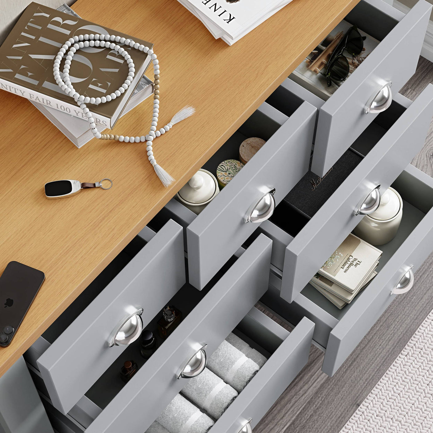 Designer chest of drawers UK with open drawers, featuring storage for accessories.
