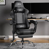 [Black] Xstriker home office chair in black PU leather, featuring ergonomic lumbar support and headrest, placed in a modern home office setup.