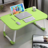 Green desk for home with tablet slot, cup holder, and foldable legs, ideal for work or study.