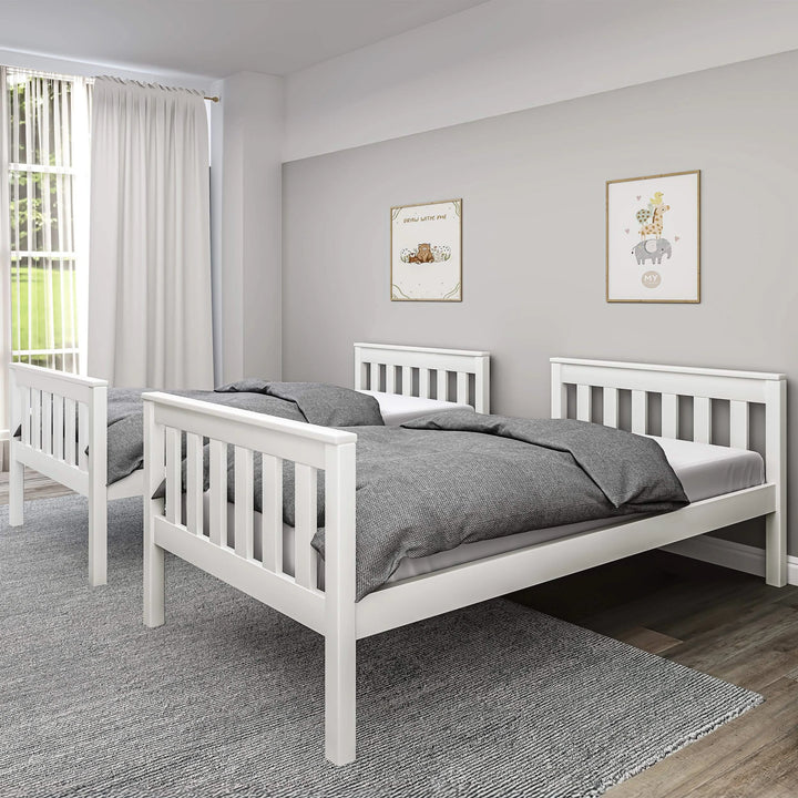 [White | Double] split configuration of white double bunk bed forming two single beds against grey wall with white curtains