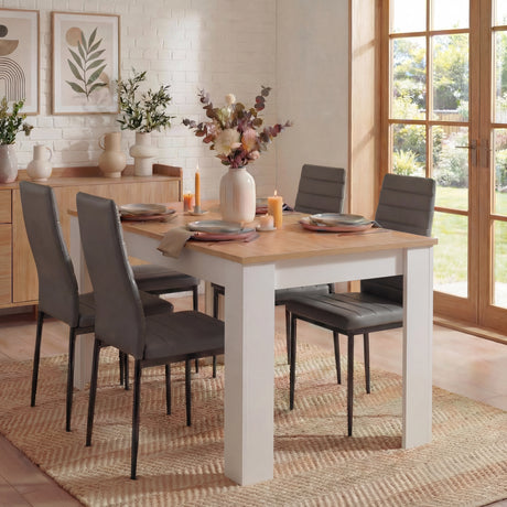 [4 Seater | Grey] dining set: oak top white pine table seating four in black PU chairs, plant and curtains behind