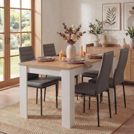 [4 Seater | Grey] grey chair 4 seater set in pale dining room with sideboard and vase centrepiece on table