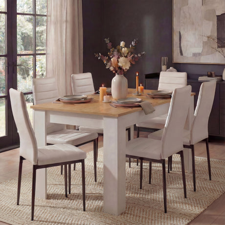 [6 Seater | White] white pine dining table set seats six on oak top, six white high-back chairs, vase and candles dressed