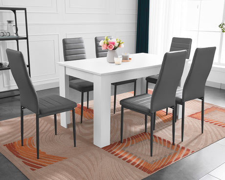 Dining table and chairs set for 6, ideal for family meals and gatherings.