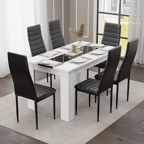 Dining table 6 seater with black padded chairs and white table featuring a black glass center, ideal for modern dining rooms.