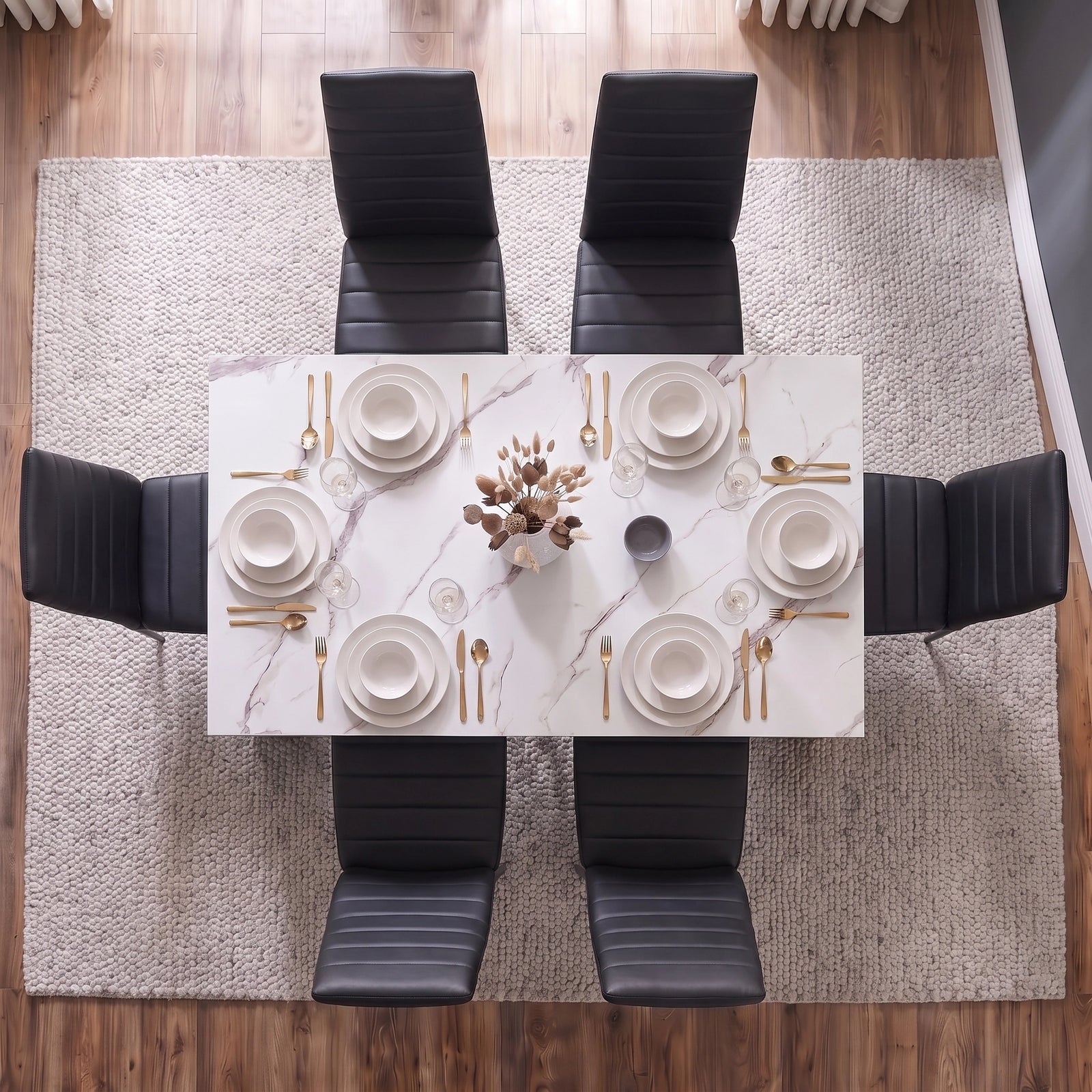 [6 Seater | Black] overhead view of dining table and 6 chairs featuring marble-effect top and black cushioned seating from overhead view