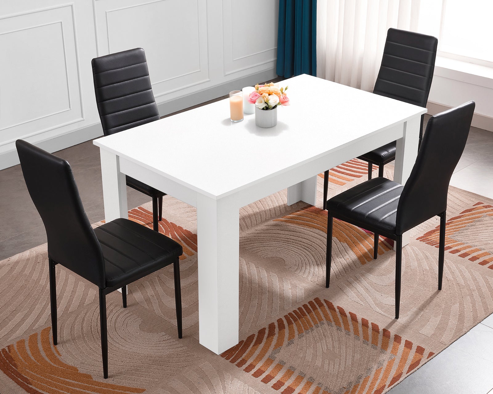 Small dining table with chairs, perfect for compact spaces and modern decor.