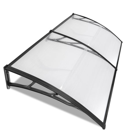 Door canopy for sale with transparent polycarbonate panels and black aluminium frame.