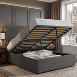 Open double bed ottoman storage with storage showing beddings stored inside, placed in a bedroom
