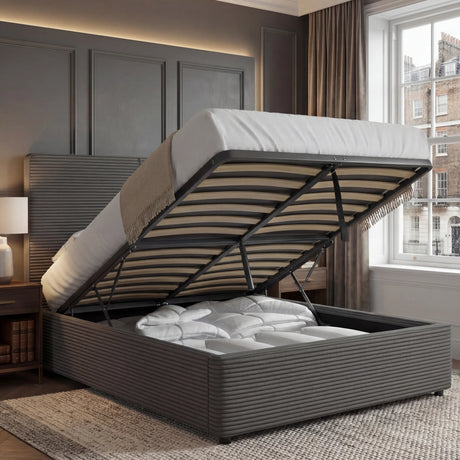 Open double bed ottoman storage with storage showing beddings stored inside, placed in a bedroom