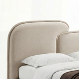 [Double | Beige] Close-up of beige split headboard with stitched upholstery and gently curved upper edge of double bed frame