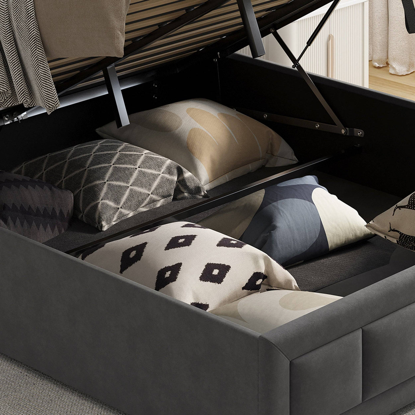 Double bed with ottoman storage, including cushions and bags for added convenience.