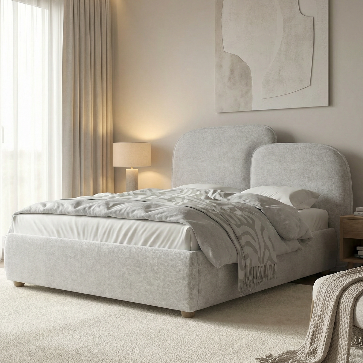 [Double | Grey] Styled grey double ottoman bed frame with curved split headboard beside lamps and nightstands