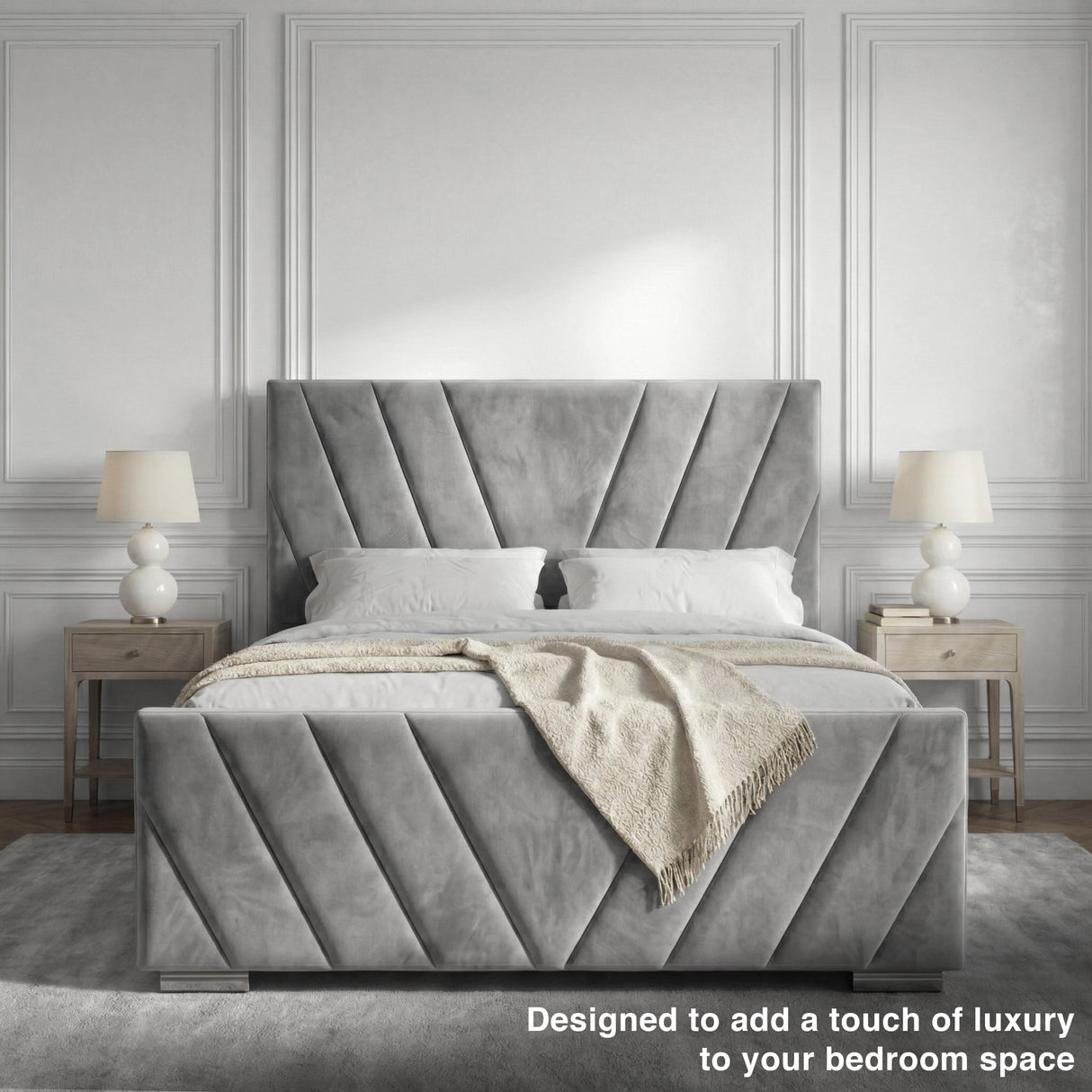 Front view of a grey velvet ottoman bed with clean lines, showcasing the padded headboard
