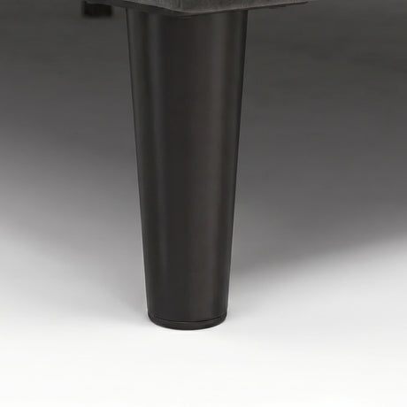 [Double | Grey] Velvet Bed Frame close-up of single black tapered solid wood leg on plain background
