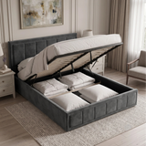 [Double | Grey] upholstered bed frame with a tufted headboard and footboard, dressed in white bedding but with the end lift open storage