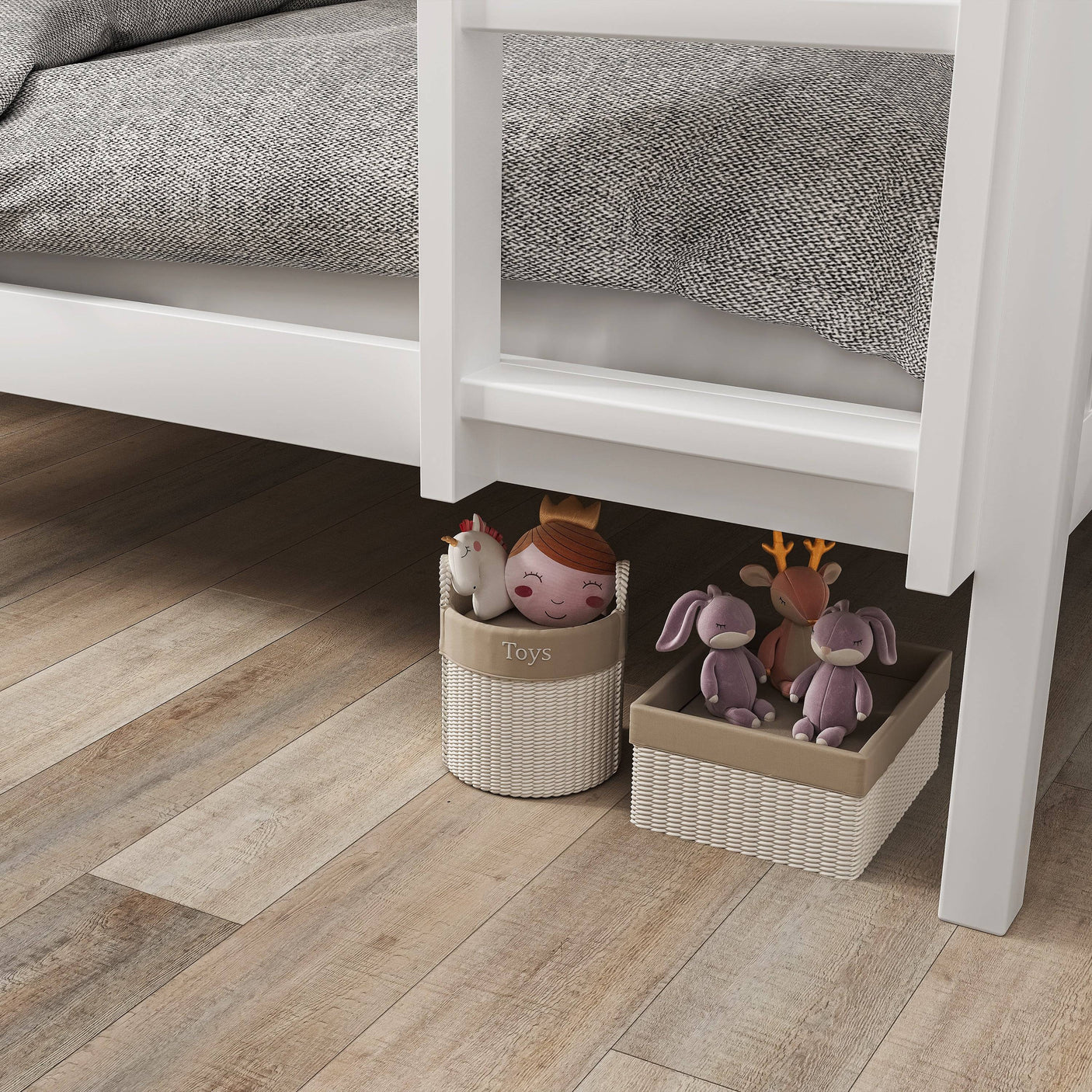 Under-bed storage space of white bunk bed with toy baskets, ideal for maximizing room space in children's bedrooms.