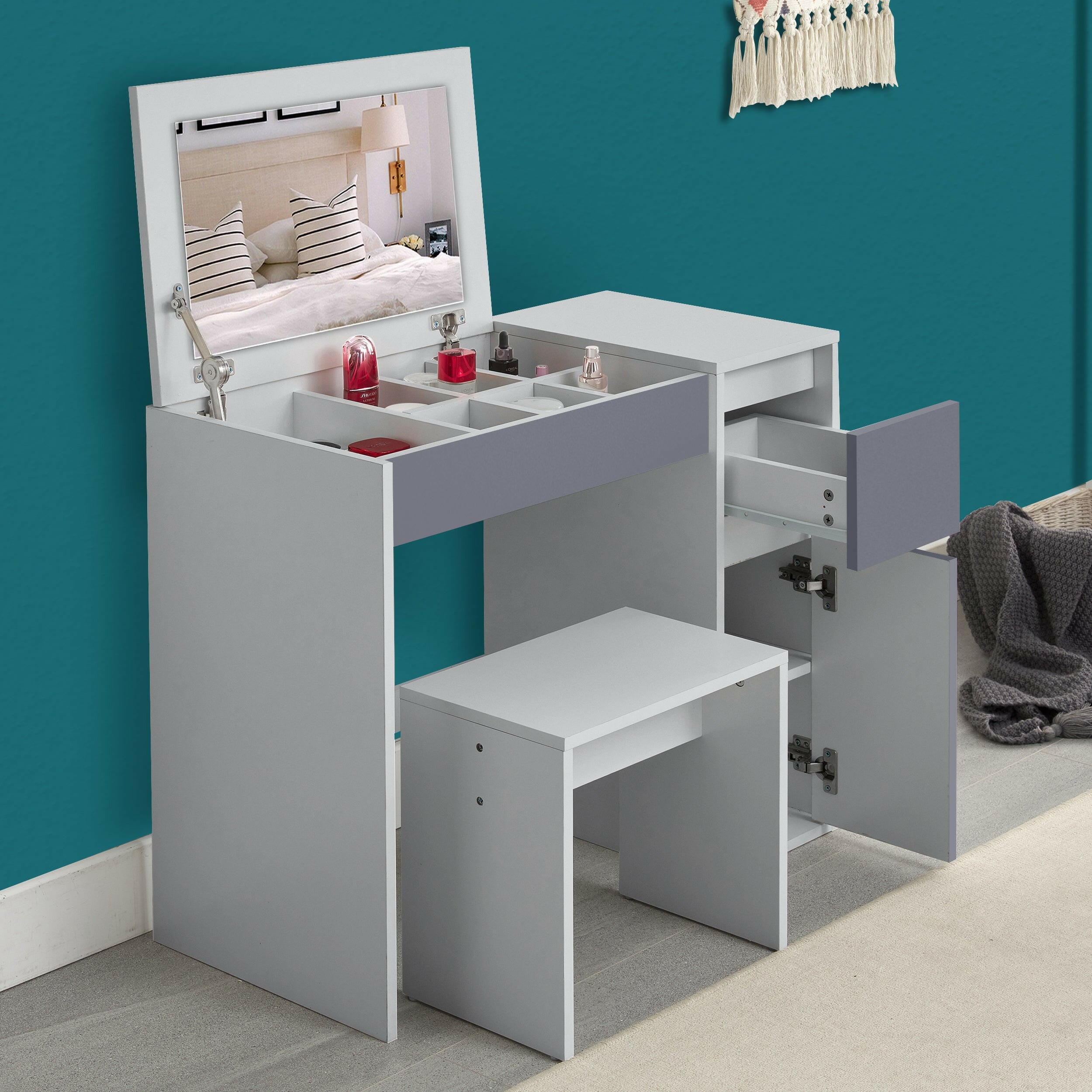 Dressing table grey with storage, mirror, and stool, featuring organized compartments.