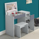 Dressing table grey with storage, mirror, and stool, featuring organized compartments.