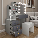 Gray vanity with mirror and lights in a room with a sofa and decor.