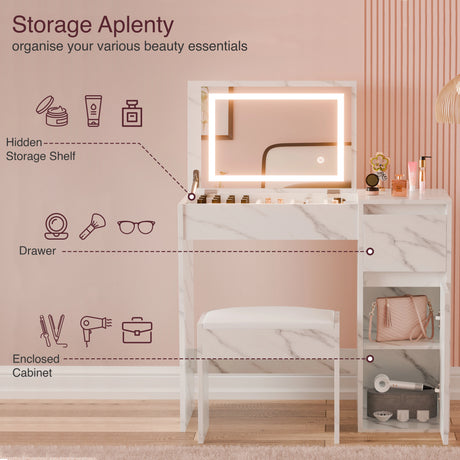 Makeup vanity with storage compartments and illuminated mirror on a pink background