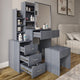 Elegant grey dressing table with drawers, mirror, and shelves for bedroom storage