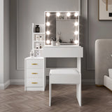 White vanity table with illuminated mirror and stool in a room setting.