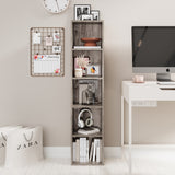 Tall rustic wood narrow bookshelf beside a desk, combining functionality with natural wood aesthetics.