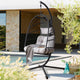 Modern egg chairs garden with a black metal frame, grey cushions, and a durable stand.