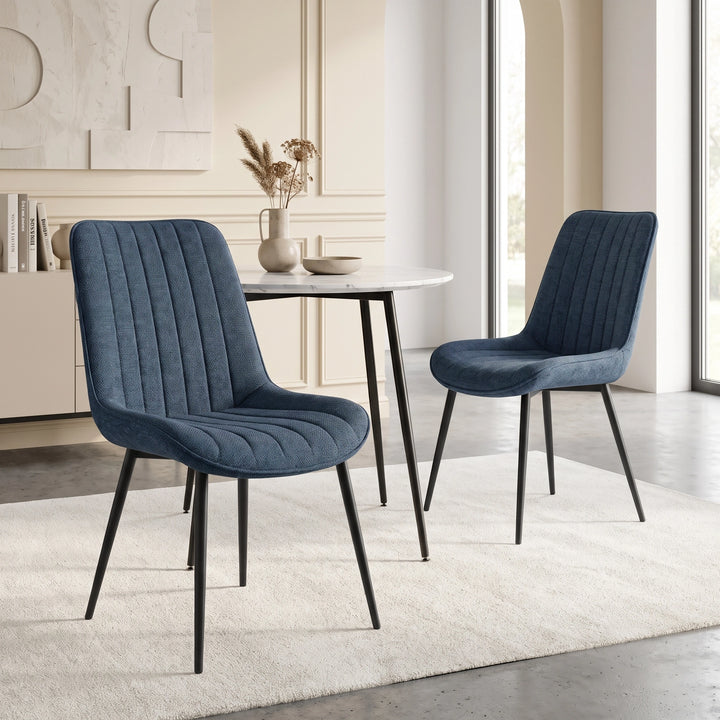 [Blue | Set of 2] Two fabric dining chairs beside a table, showing curved backs and slim black metal legs