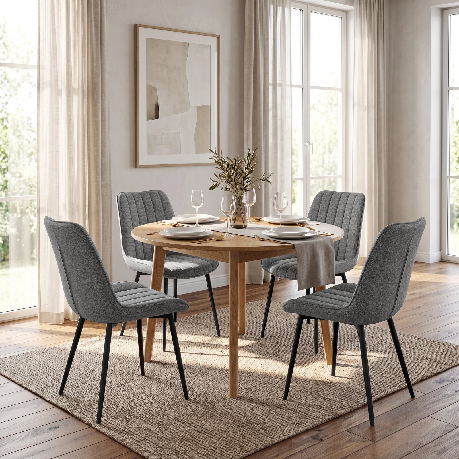 [Grey | Set of 2] Four fabric dining chairs around a round table in a bright dining room