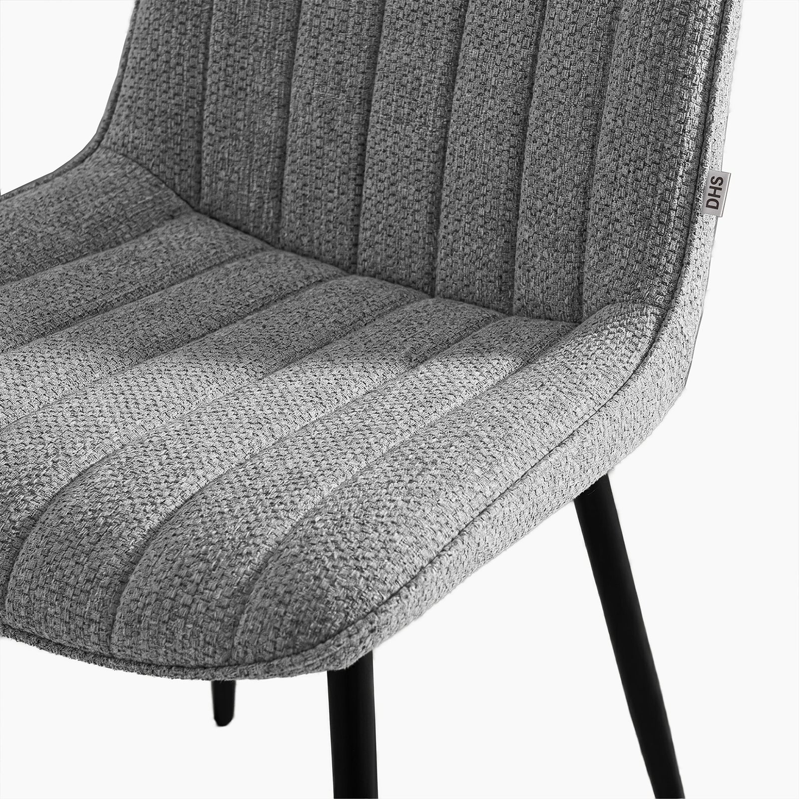 [Grey | Set of 2] Close-up of fabric dining chair seat and back showing textured vertical stitched padding