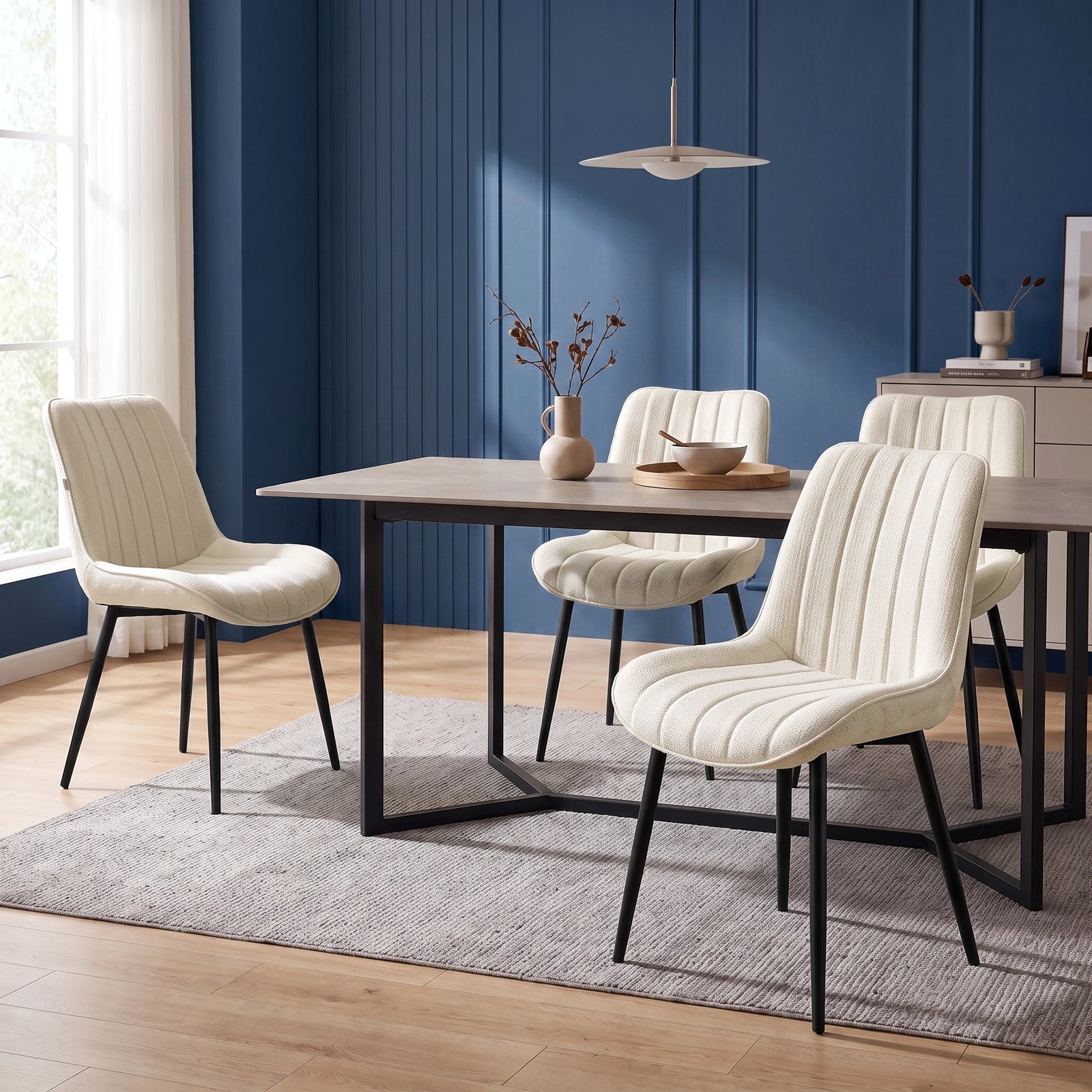 [Beige | Set of 4] Four fabric dining chairs around a rectangular table in a styled dining room
