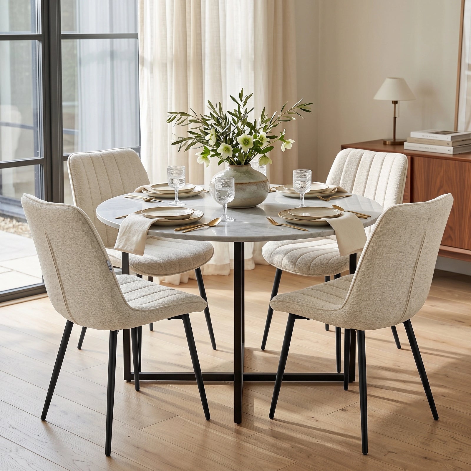 [Beige | Set of 4] Four fabric dining chairs around a round table in a bright dining room