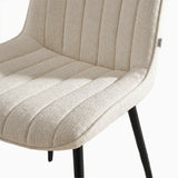 [Beige | Set of 4] Close-up of fabric dining chair seat and back showing textured vertical stitched padding